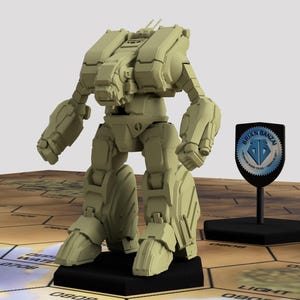 May include: A light green, mechanical robot model with a detailed design, standing on a black base. A shield-shaped emblem with the text "BRIAN BANZAI" is to the right. The model is on a hexagonal grid.