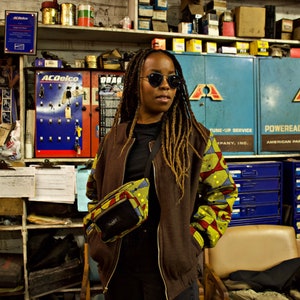 Bomber jacket with African print contrast fabric