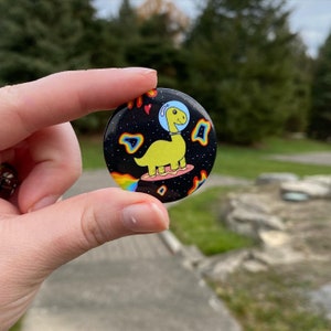 Astro Dino pin