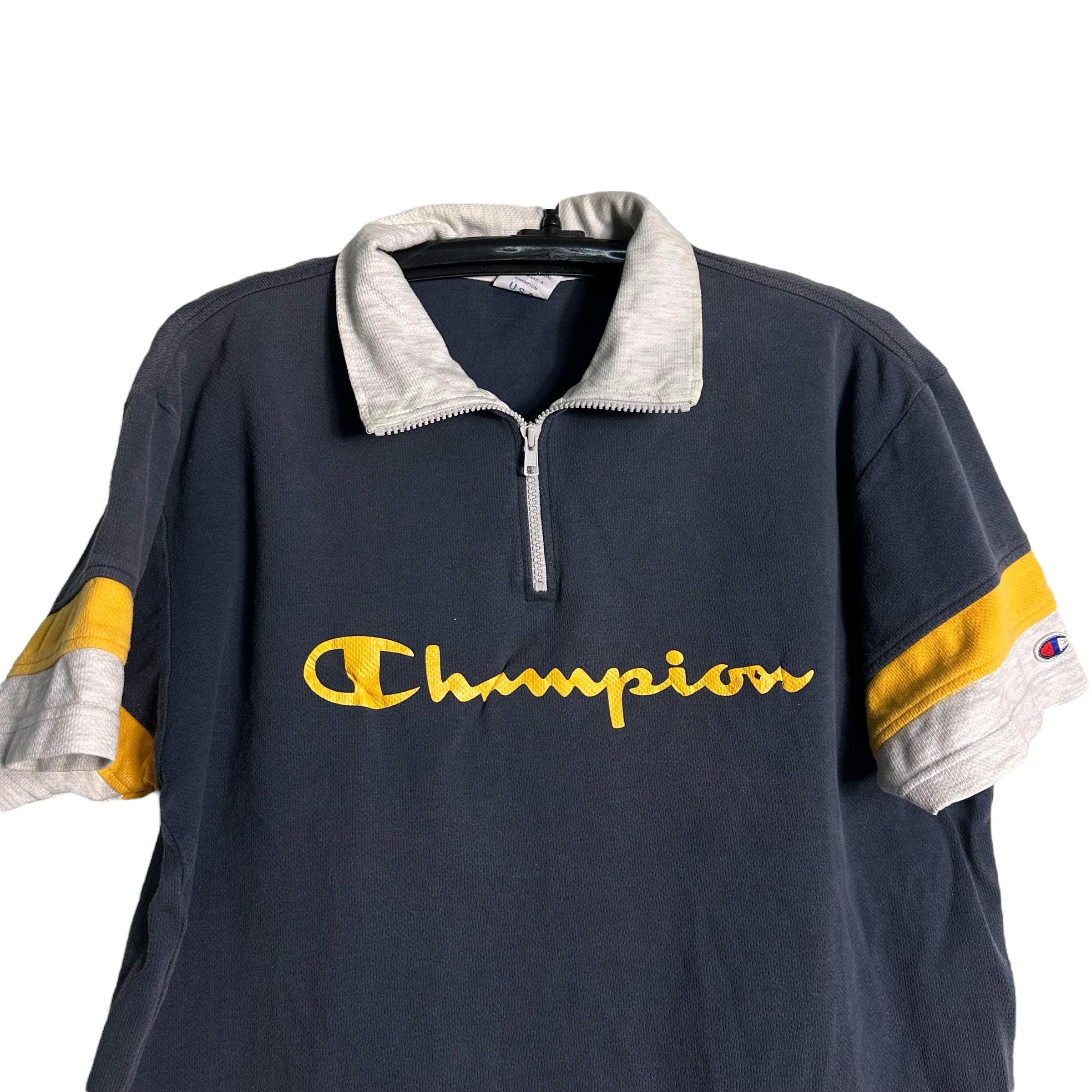 Felpa polo a maniche corte con mezza zip e scritta Spell Out Vintage  Champion
