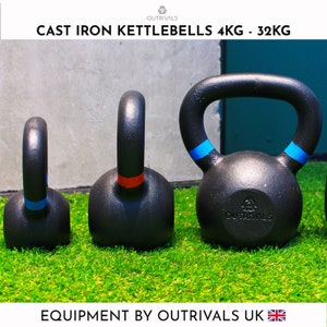 May include: Three black cast iron kettlebells with blue and red accents. The kettlebells are arranged in a row on a green artificial grass surface. The largest kettlebell has the text "OUTRIVAL" printed on the side. The text "CAST IRON KETTLEBELLS 4KG - 32KG" is printed at the top of the image. The text "EQUIPMENT BY OUTRIVAL UK" is printed at the bottom of the image.