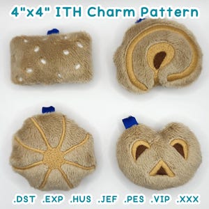 May include: Four plush charm patterns in various shapes, including a rectangle, a spiral, a pumpkin, and a pumpkin-shaped face. Each charm is tan with brown and blue accents. The text "4"x4" ITH Charm Pattern" is at the top.