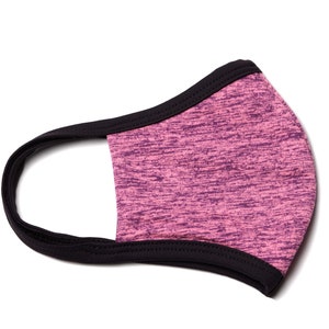 May include: A pink and black face mask with a black elastic band. The mask is made of a soft, breathable fabric.