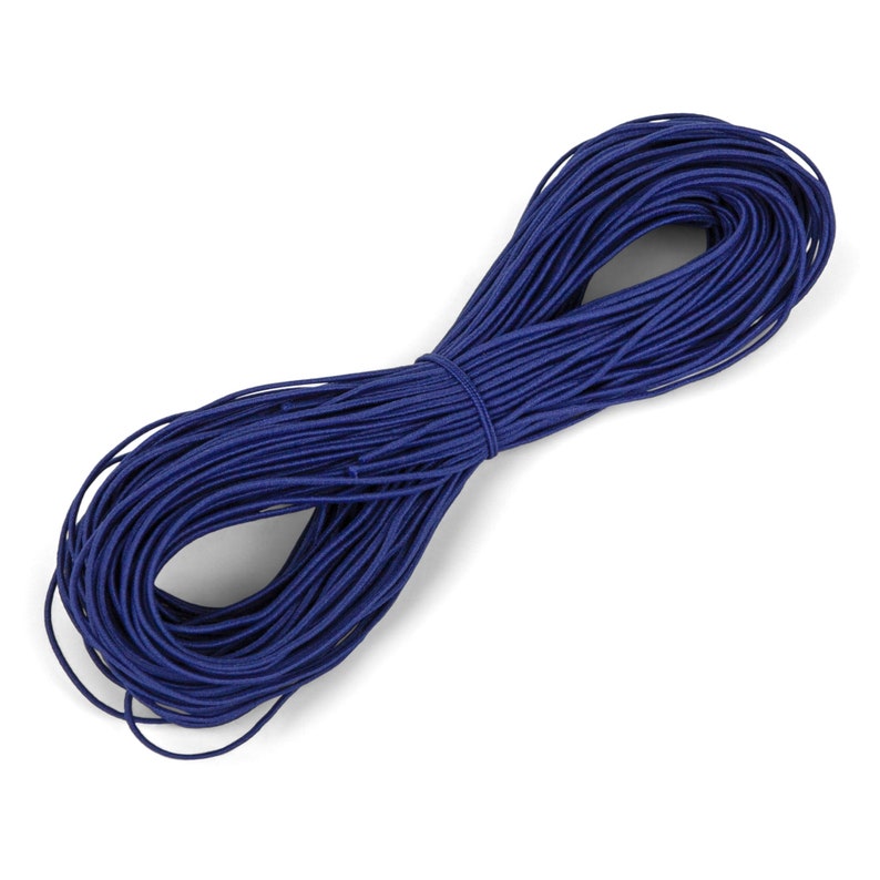 May include: A bundle of navy blue elastic cord, tightly wound and secured. The cord is a deep, saturated blue, and appears smooth and flexible. The product is suitable for crafts, sewing, or other projects requiring elastic.