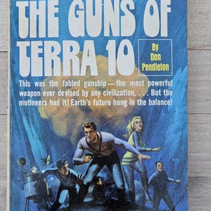 May include: Vintage paperback book cover for "The Guns of Terra 10" by Don Pendleton. The cover features a blue background with a spaceship and a group of people in futuristic attire. Text includes the title and author.