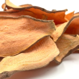 May include: A pile of crispy, orange-brown sweet potato chips. The chips are thin and have a slightly irregular shape.