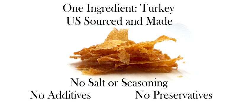 May include: A pile of dried turkey meat, with the text "One Ingredient: Turkey US Sourced and Made No Salt or Seasoning No Additives No Preservatives".