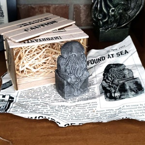 Cthulhu Stone Idol |  Newspaper & Crate | Lovecraft Concrete Statue | Mythos Occult Prop