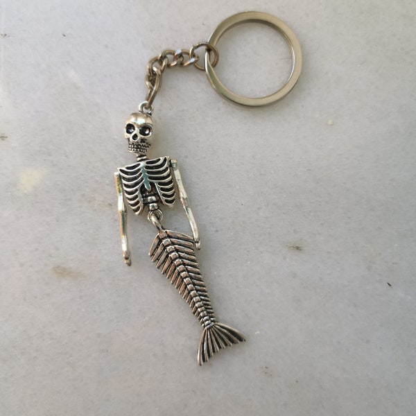 Skeleton skull mermaid tail keychain, skull, bones and fish tail charm, silver funny keyring gift for gothic, horror or ocean beach lovers