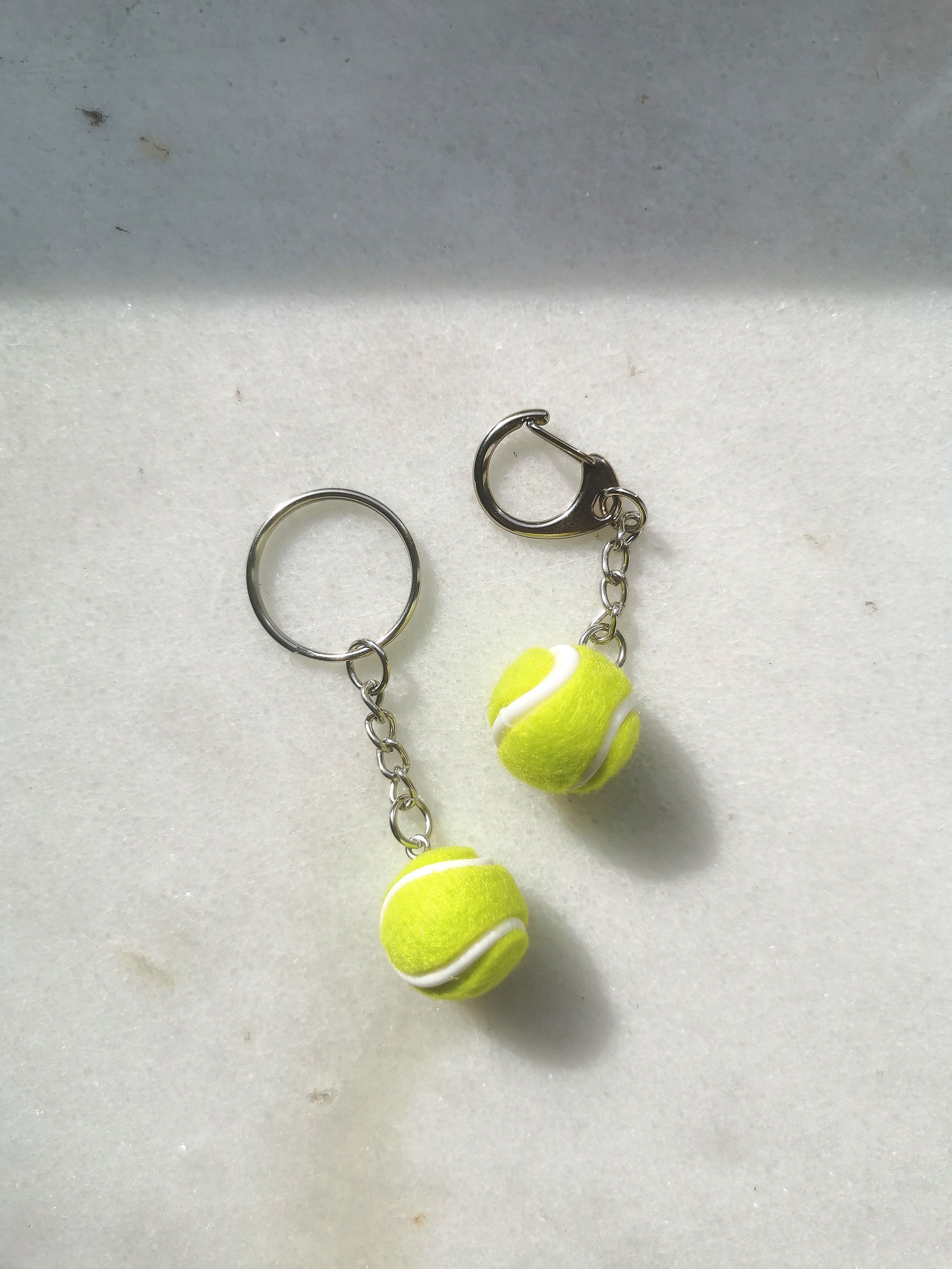 Mini tennis ball keychain best sale