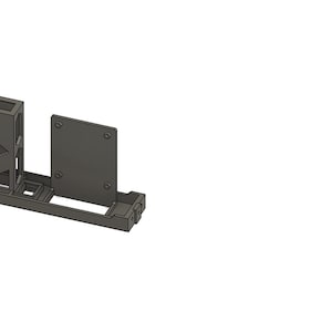 May include: A dark gray 3D-printed object with a rectangular base and angled, geometric shapes. The design includes a slanted, open-faced box and a separate rectangular plate. The text "Print3DStore" is visible.