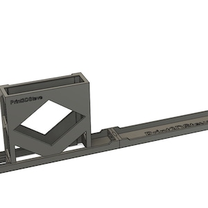 May include: A grey 3D printed model of a game board with the text "Print3D.Store" on the side. The board is made up of a long, rectangular track with a small, square platform at one end.