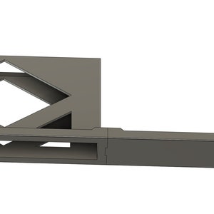 Puede incluir: Un soporte de filamento para impresora 3D de color gris con el texto "Print3DSlave" en la parte delantera. El soporte tiene una forma rectangular con una extensión larga y estrecha en el lado derecho.