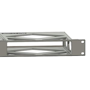 May include: A silver metal rack with a geometric design. The rack has two levels and is designed to hold items.