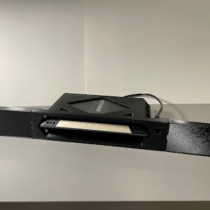 Netgear CM1100、CM1000、または CM600 ケーブル モデム - ラック マウント