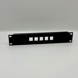 May include: A black metal rack panel with four square cutouts and two mounting holes. The panel is rectangular and designed for mounting in a standard equipment rack. The finish is matte black.