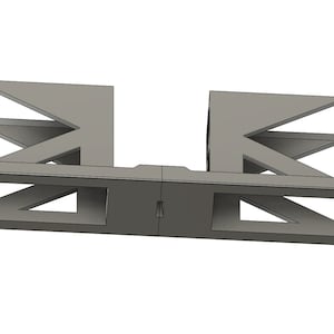 以下が含まれることがあります： ダイヤモンド型の模様がついた2つのオープンコンパートメントを持つ灰色の金属製ラック。ラックには「Print3Dstore」というラベルが貼られています。