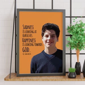 May include: A motivational quote by Blessed Carlo Acutis on a bright orange background with a portrait of him. The quote reads: "Sadness is looking at ourselves. Happiness is looking towards God."