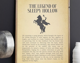 May include: A vintage-style print of a black and white illustration of the Headless Horseman riding a horse. The text "THE LEGEND OF SLEEPY HOLLOW" is at the top of the print. The text below the illustration describes the scene from the story.