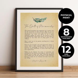 May include: A framed wall art print featuring The Oath of Maimonides in black text on a textured, light tan background. A green watercolor leaf illustration sits above the title. The text includes the full oath and the name Angelica Reyes, MD.