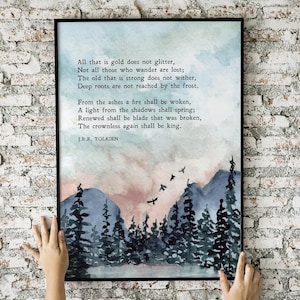May include: A watercolor painting of a forest with a quote by J.R.R. Tolkien: "All that is gold does not glitter, Not all those who wander are lost; The old that is strong does not wither, Deep roots are not reached by the frost. From the ashes a fire shall be woken, A light from the shadows shall spring; Renewed shall be blade that was broken, The crownless again shall be king."