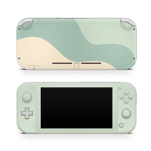 May include: A green and cream Nintendo Switch Lite handheld gaming console with a wavy abstract design on the back. The console is shown in both front and back views.