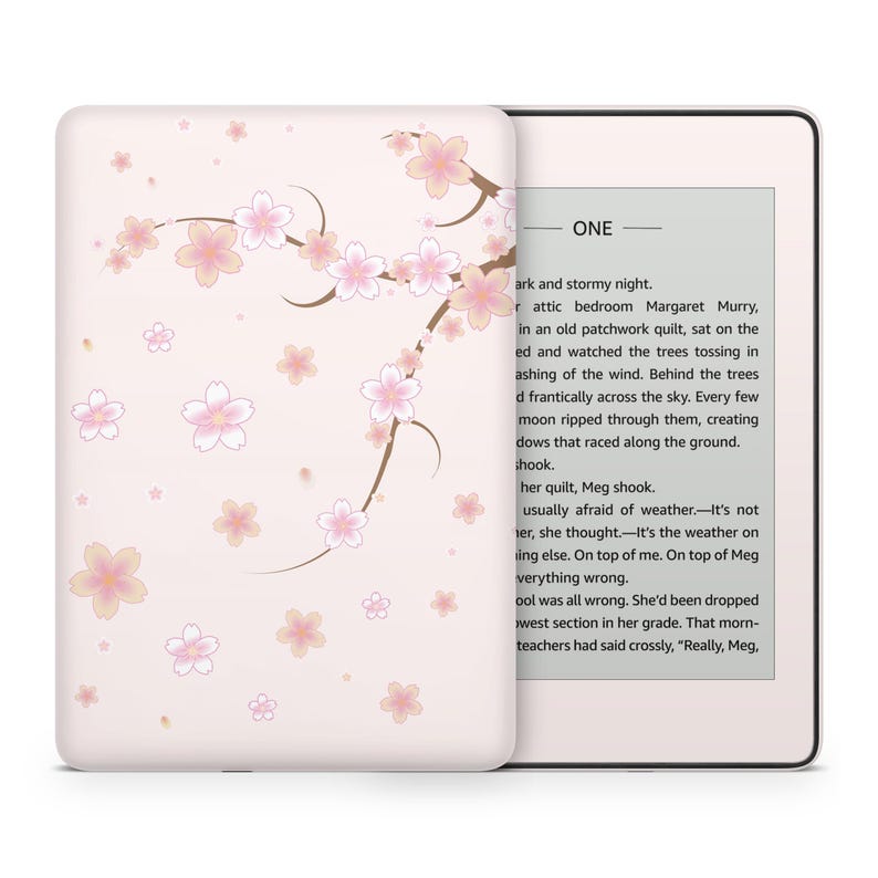 May include: A pink and white Kindle Paperwhite e-reader with a floral design on the case. The screen displays the text "ONE" and a short excerpt from a book.
