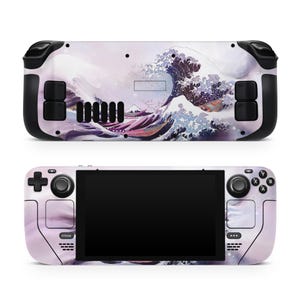 May include: A handheld gaming console with a custom skin featuring a Japanese wave design in shades of purple, blue, and white. The console has black control buttons and a black screen. The design covers the front and back of the device.