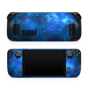 May include: A blue and black handheld gaming console with a galaxy design. The console has a large screen, two joysticks, and a variety of buttons.