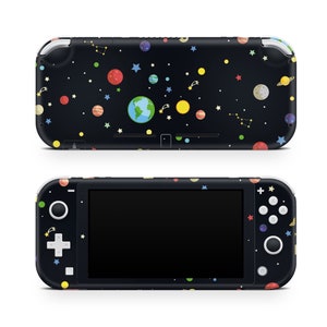 May include: A black Nintendo Switch Lite console with a space-themed design. The console features a black background with colorful planets, stars, and constellations.