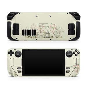 May include: Cream-colored handheld gaming console skin featuring a floral garden design with a pagoda and trees. The skin covers the front and back of the console, with black accents on the sides and buttons. The screen is black.