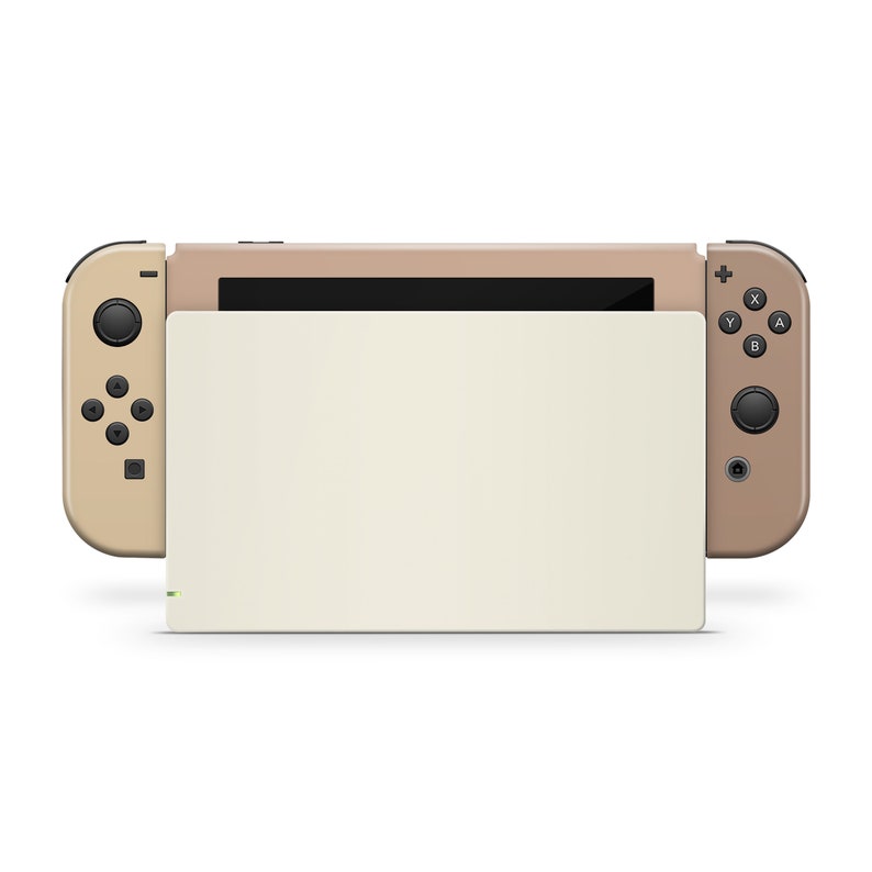 Pu&ograve; includere: Una console Nintendo Switch beige con uno schermo bianco e pulsanti neri. La console &egrave; chiusa e i controller Joy-Con sono collegati.