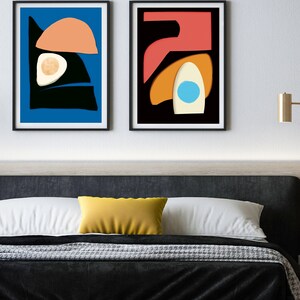 Two unique abstract art prints for bedroom, creating a fun and bright colors to surrounding neutral color bedroom interior.