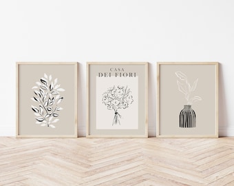 Moderno conjunto botánico minimalista de 3 estampados, estética neutra printable wall art, flores y hojas en tonos negros beige y blanco