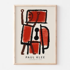 Puede incluir: Una impresión enmarcada de una pintura abstracta de Paul Klee titulada "Locksmith 1940". La pintura presenta una figura roja y negra con formas geométricas.