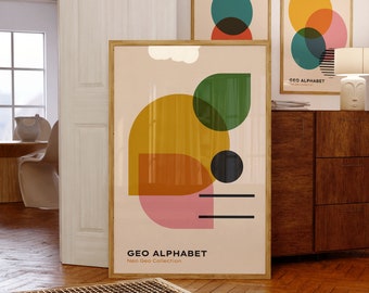Peut inclure: Une impression d'art abstrait géométrique avec un schéma de couleurs jaune, orange, rose, vert et noir. L'impression présente des cercles et des lignes qui se chevauchent. Le texte "GEO ALPHABET Neo Geo Collection" est en bas de l'impression.