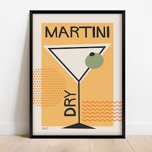 May include: A black framed poster with a yellow background and a martini glass with an olive. The text "MARTINI DRY 1863" is printed on the poster.
