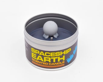 Spaceship Earth Scented Candle | Experience the Epcot ride in the form of a candle | OK, maybe "experience" is a stretch. Let's say "recall"