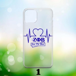 May include: A clear phone case with a blue heartbeat design featuring the letters "Z&Phi;B" and the text "Zeta Phi Beta".