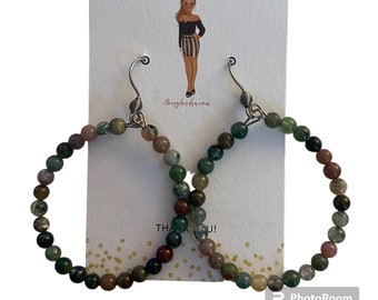 Beaded hoop earrings in multi colored or black/grey beads