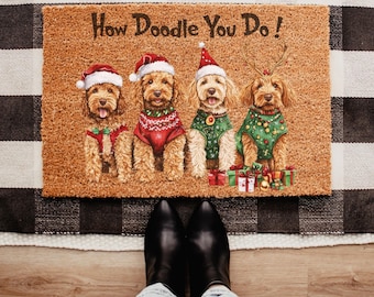May include: A rectangular doormat with the phrase "How Doodle You Do!" features four cartoon dogs dressed in Christmas attire. The dogs wear Santa hats and sweaters, with presents at their feet. The mat is brown with a black and white checkered border.