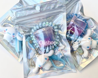 5 pcs Kawaii Character Party Favor Pack: Keychain, Bracelet, Slime, Sticker Sheet