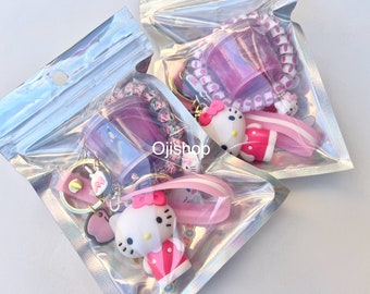 Cute Kitty Birthday Party Favor Pack, Keychain, glitter Putty, Sticker sheet and Spiral Hair tie/Bracelet hand curated pack