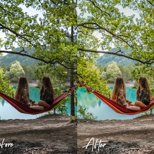 May include: Two people relax in a red and yellow hammock overlooking a turquoise lake. The hammock is strung between two trees. Lush green trees and mountains are in the background.