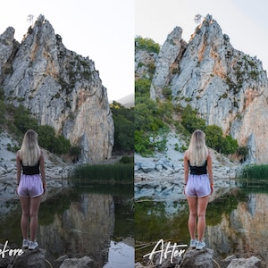 May include: A woman wearing pink shorts and a black vest top stands on a rock by a lake, looking at a large rock formation in the distance. The lake is calm and reflects the sky and the rock formation.