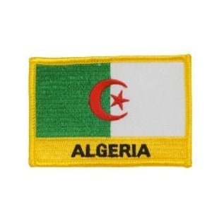 May include: A yellow embroidered patch with the Algerian flag and the word "ALGERIA" in black text.