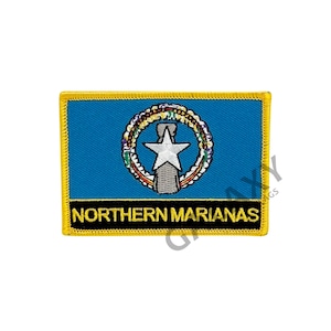 May include: A blue and yellow embroidered patch with the seal of the Northern Mariana Islands and the text "Northern Marianas".
