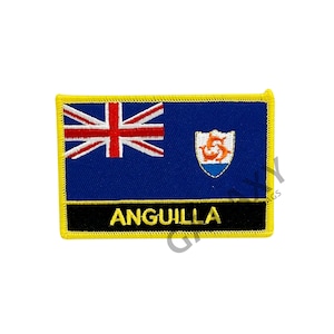 May include: An embroidered patch with the flag of Anguilla. The flag is blue with a Union Jack in the upper left corner and the Anguilla coat of arms in the upper right corner. The patch has a black border with the word "ANGUILLA" in gold lettering.
