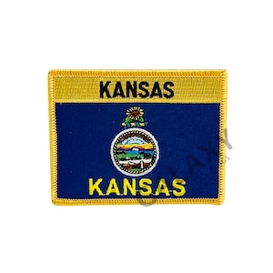 May include: An embroidered patch featuring the state seal of Kansas, with the word "KANSAS" written twice in black.