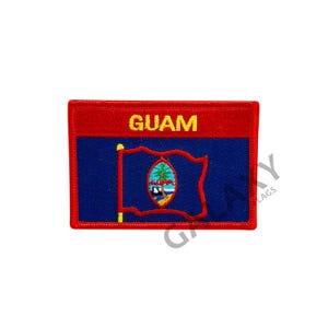May include: An embroidered patch featuring the flag of Guam. The patch is red, blue, and yellow with the words "GUAM" in yellow at the top.